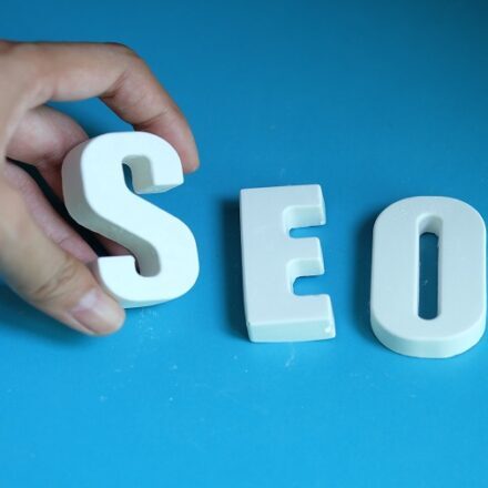 Hand arrange white letters as SEO